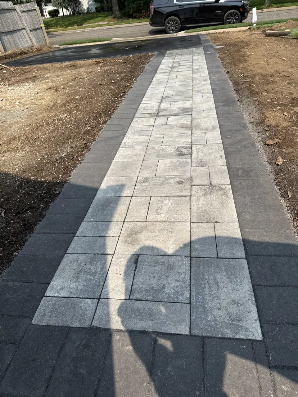 New light paver walkway with charcoal border